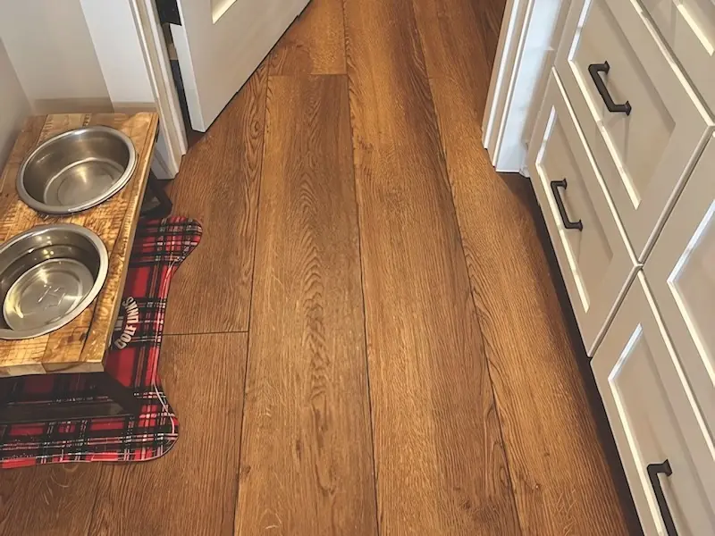 Same pantry with new wood-look luxury vinyl plank flooring