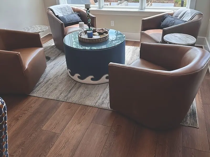 Same sitting area with new luxury vinyl plank flooring